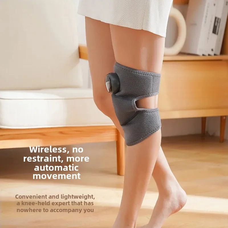 Wireless heating knee massager worn while walking, lightweight design with adjustable straps for pain relief and unrestricted movement