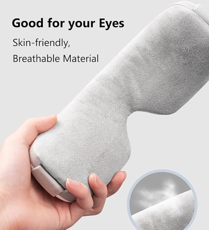 Close-up of electric eye massager with soft skin-friendly breathable fabric, designed for comfort, relaxation, and eye strain relief